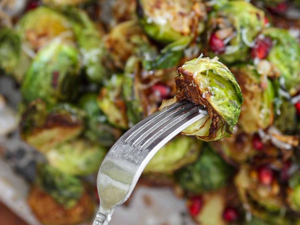 close up of roasted brussels sprouts on fork